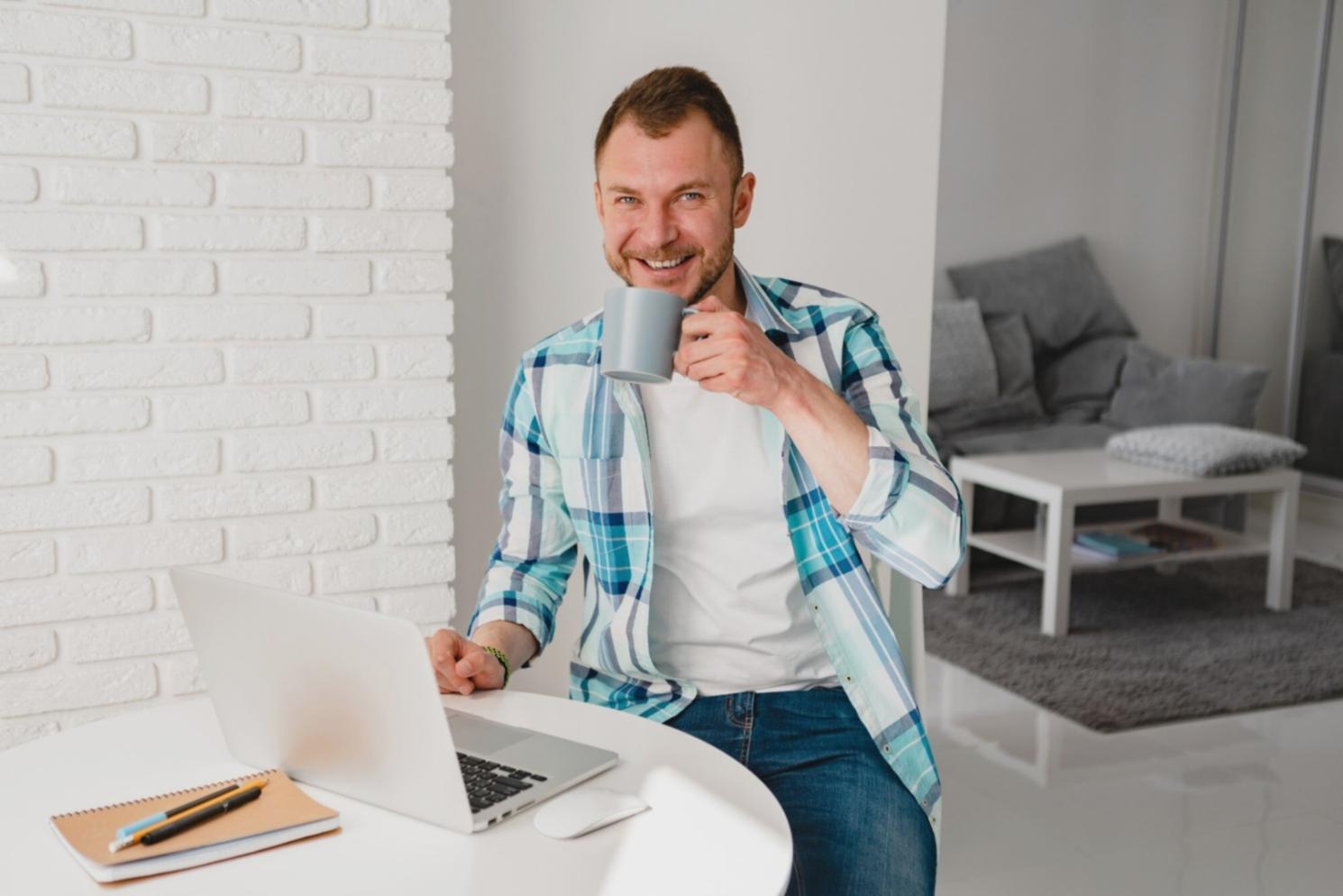 Financial analyst reviewing complex spreadsheets and charts at modern workspace